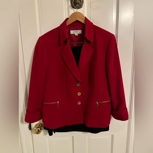 Two pieces. Red jacket with black skirt